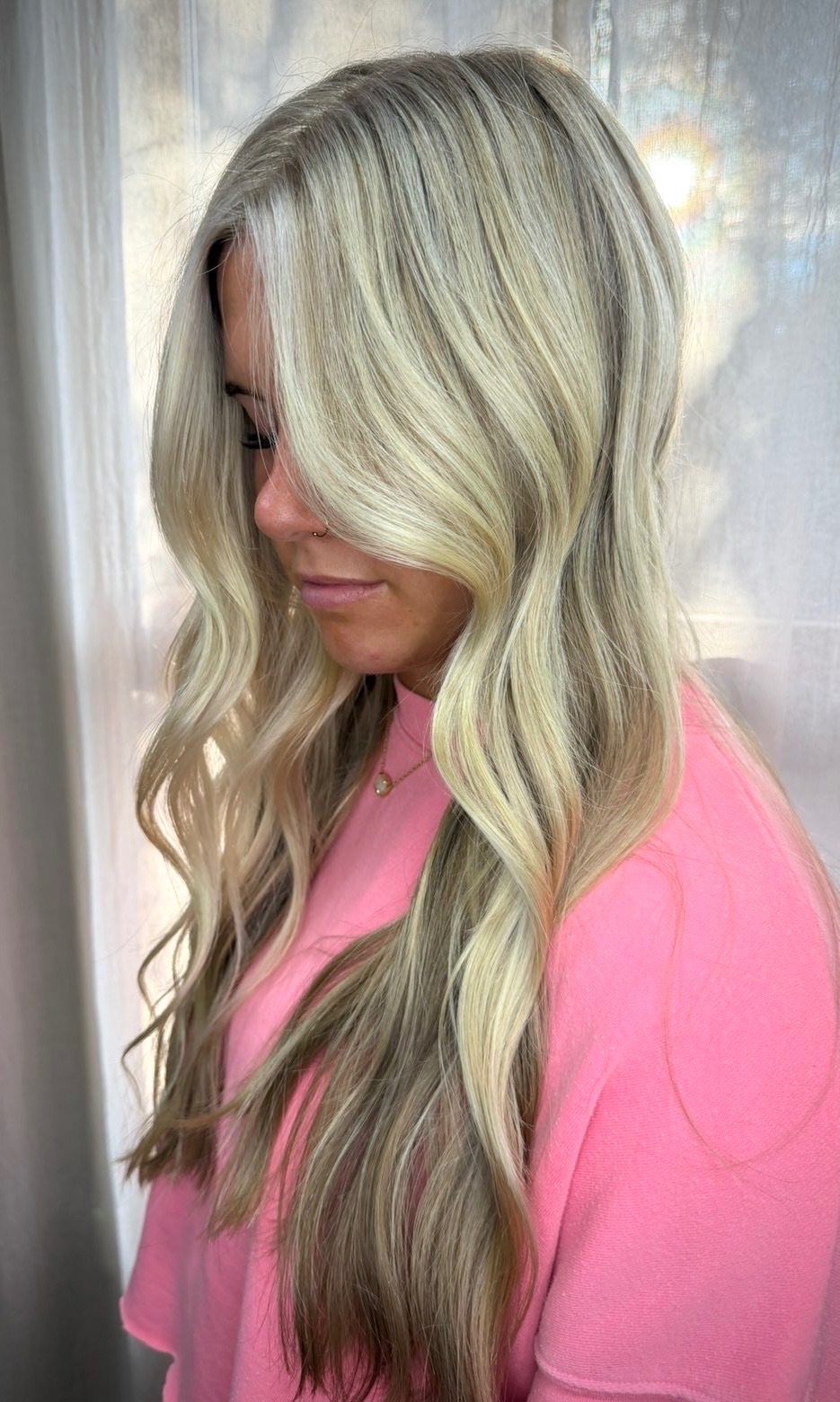 Cool blonde worn very long with a soft wave.